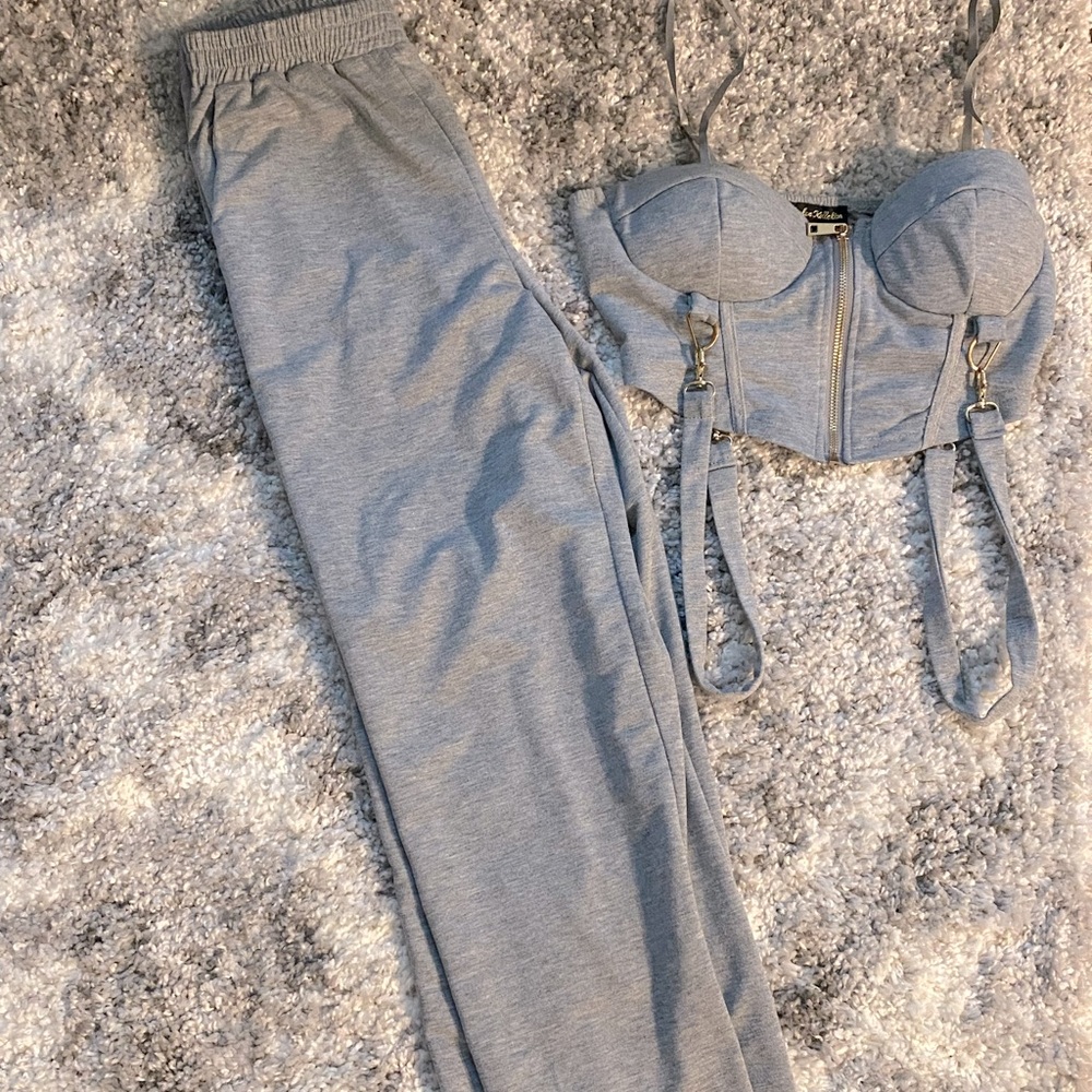 Two piece grey set. Corset top. Grey sweats. Fits a bit loose. Medium size.